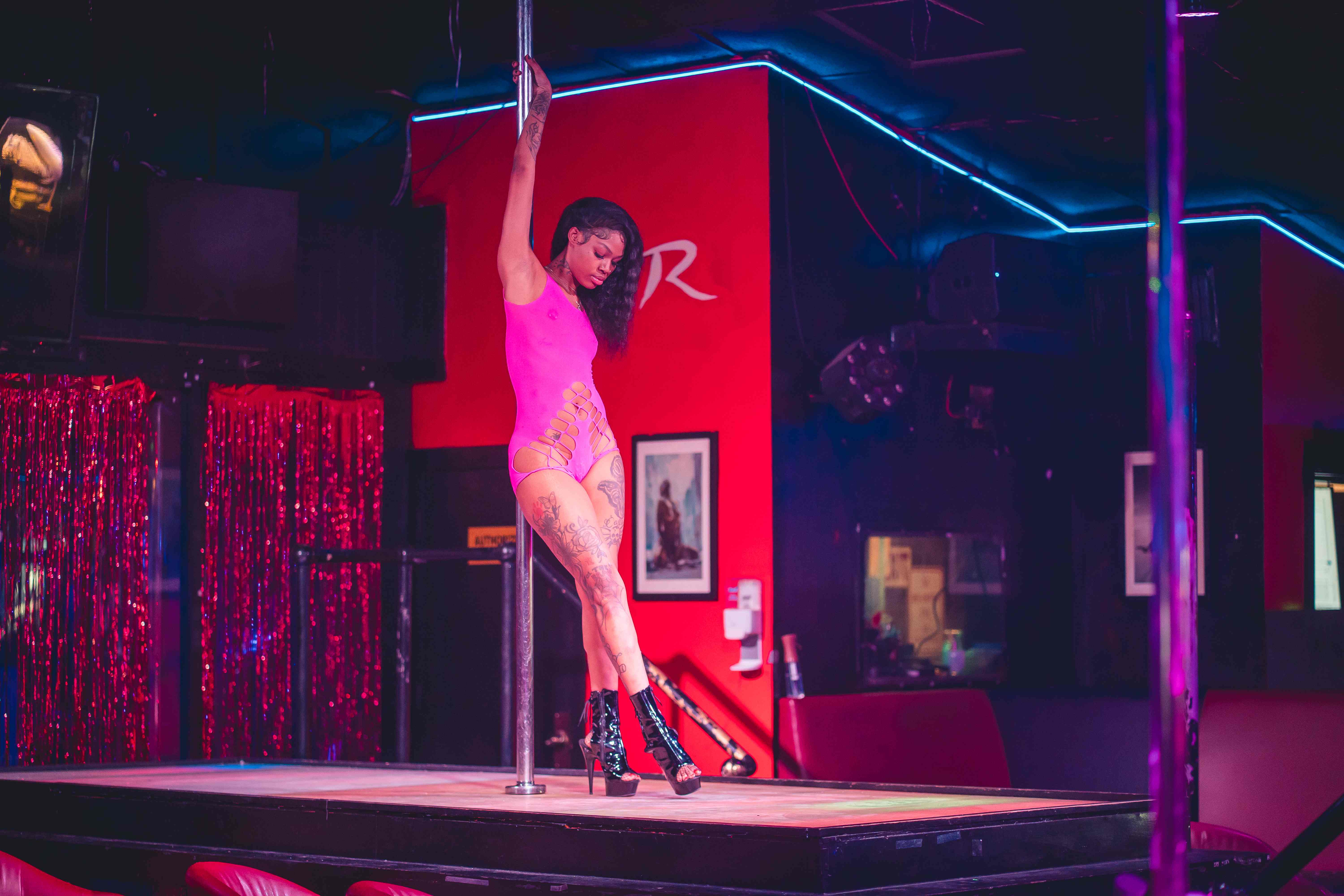 Pink bodysuit performer